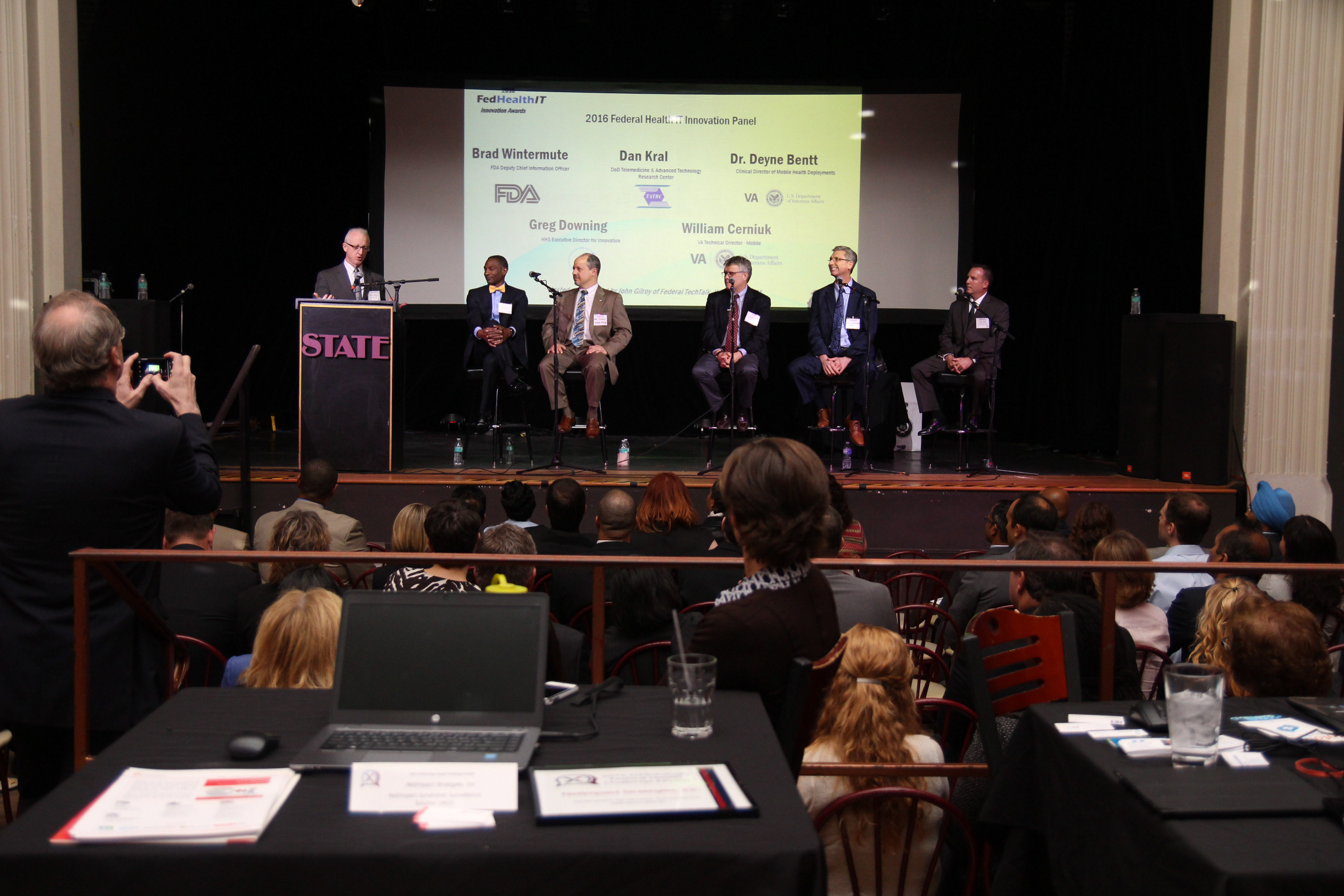 Event videographer Baltimore covering a corporate summit panel at a convention venue